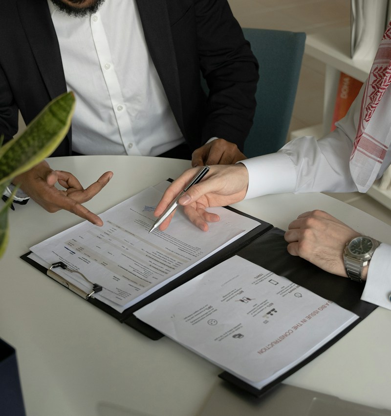Attorneys reviewing real estate documents together